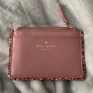 Pink Kate Spade card holder with pink sparkle rim